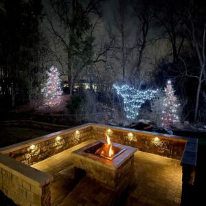 picture of backyard fire pit and seating wall